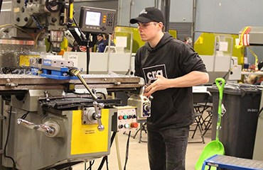 Student uses his head and hands to forge career